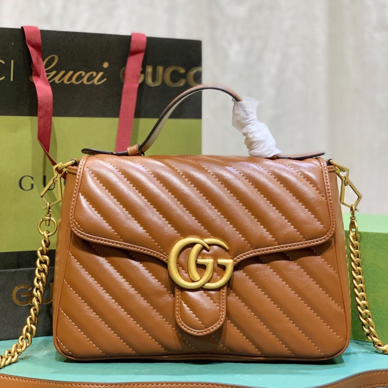 G*u*i top handle bags